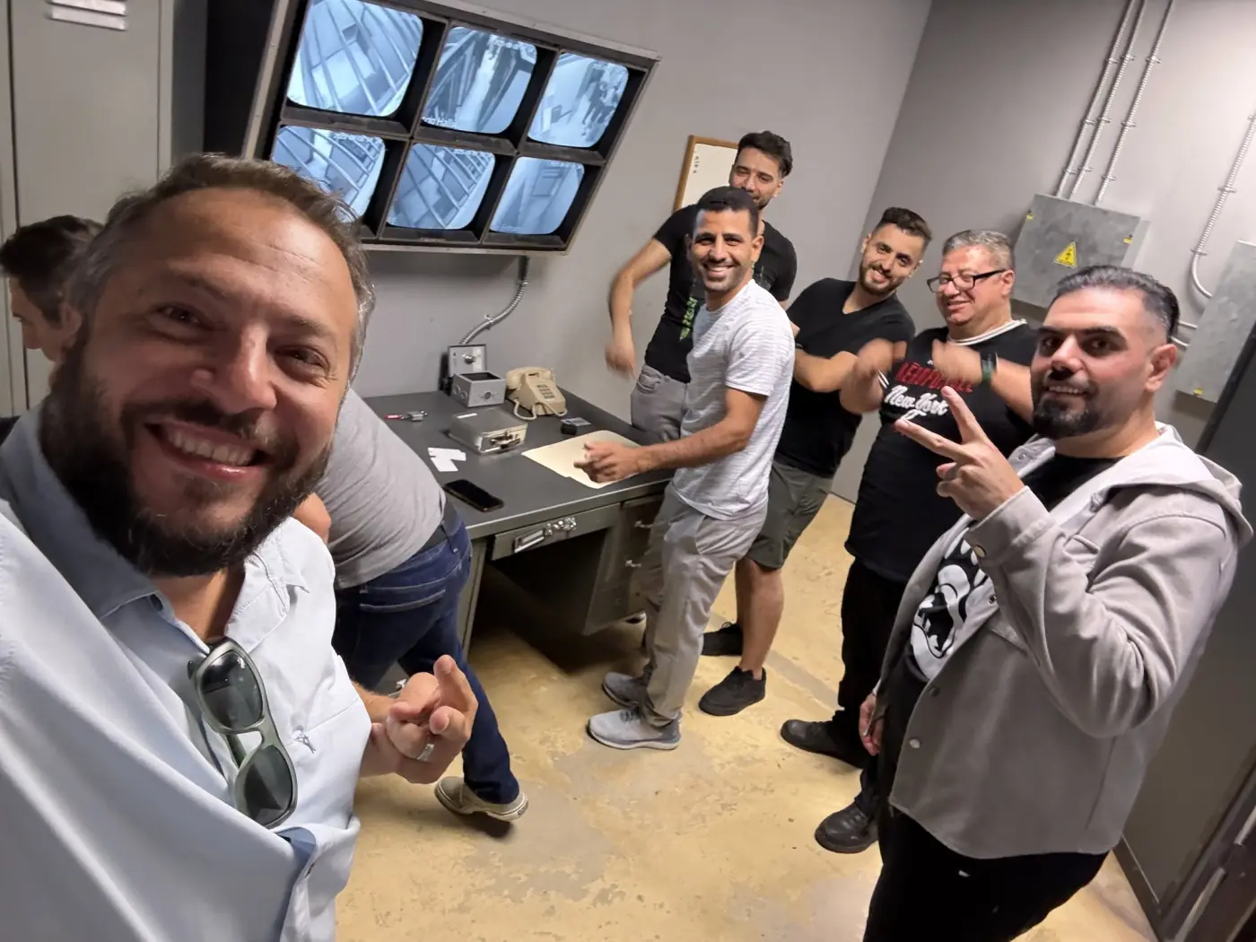 A selfie with the AMBA team smiling behind the counter